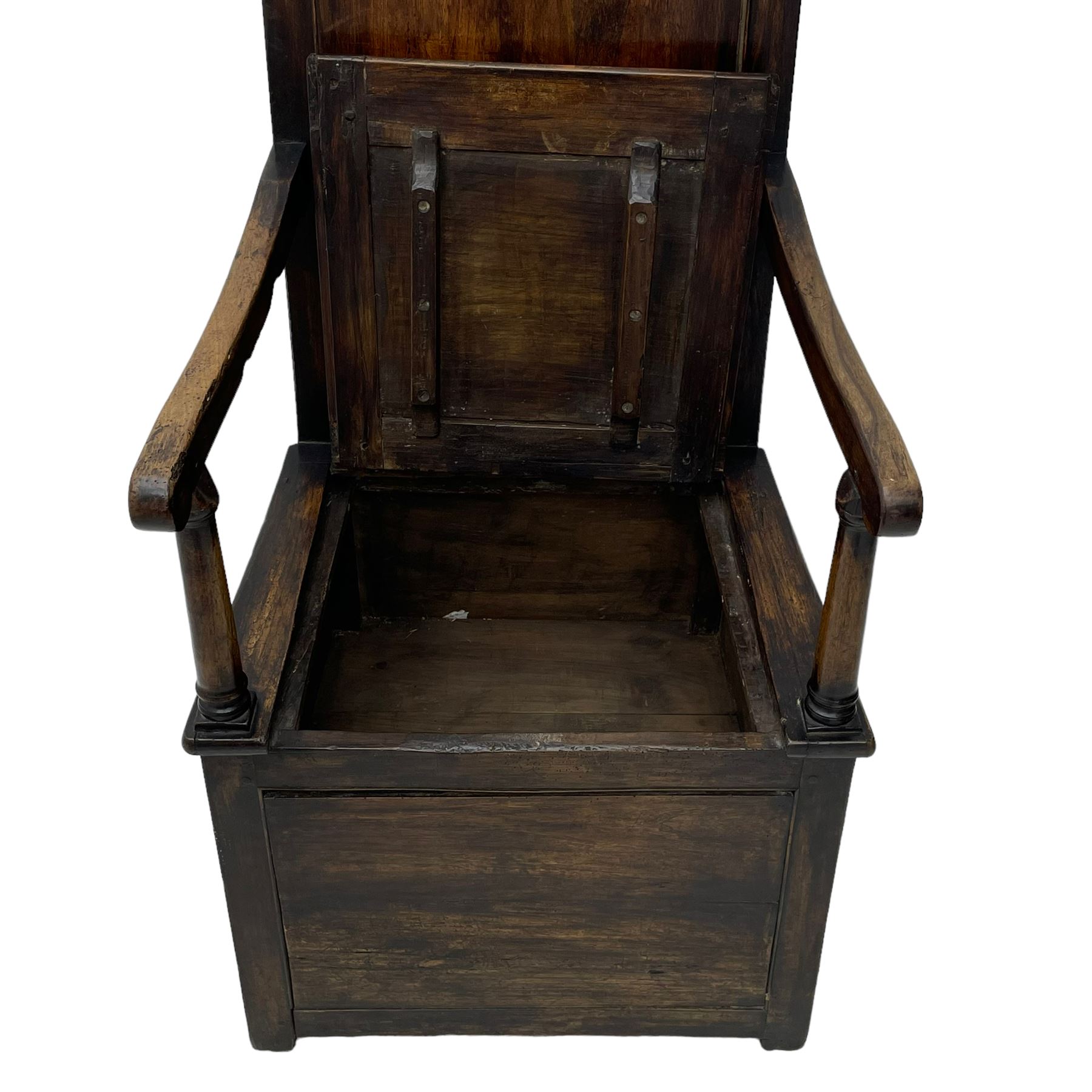 18th century elm box-seat lambing chair, dished cresting rail over panelled back, panelled hinged lid flanked by two turned arm supports