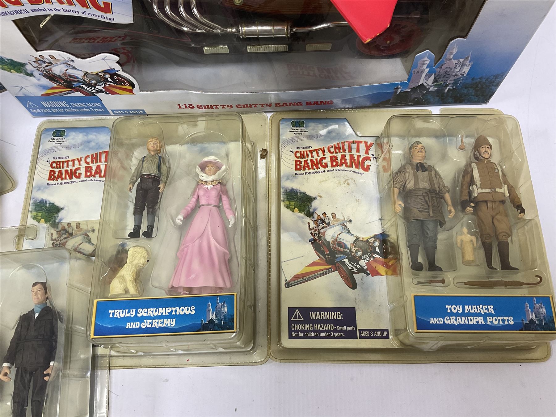 Collection of Chitty Chitty Bang Bang figures and model cars both loose and boxed, to include ‘Truly Scrumptious and Jeremy’ blister pack signed by Adrian Hall