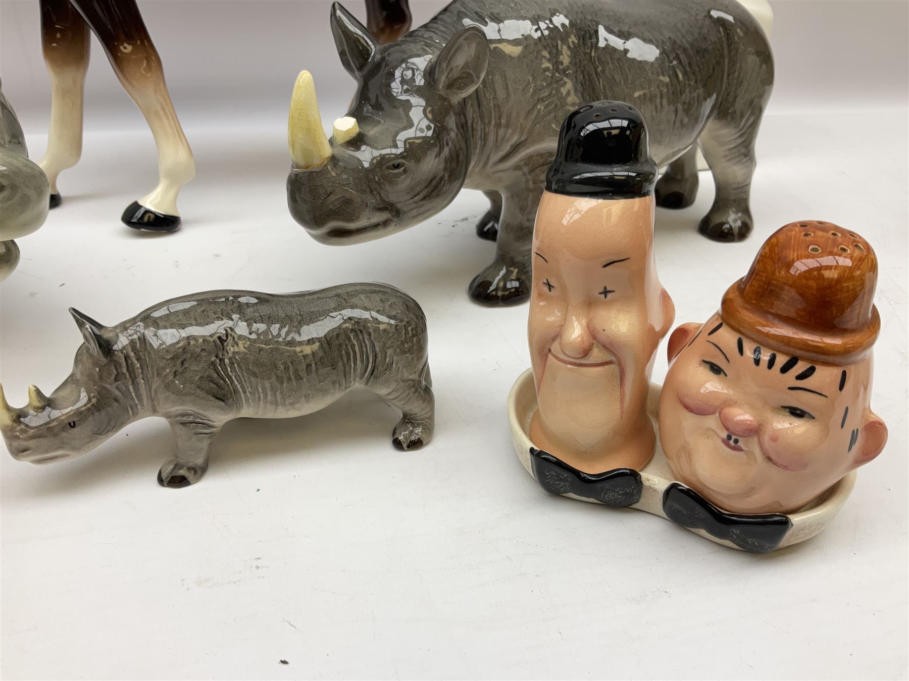 Beswick model of a seated bulldog, model no. 1872, Beswick Laurel & Hardy cruet set on stand, no. 575, Melba Ware animal figures to include large horse, hippo, rhino, USSR tiger cub figure, other ceramics to include Mason's lidded jar etc