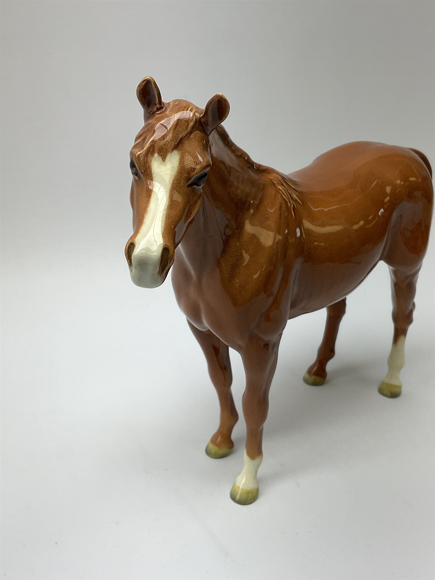 A Beswick figure modelled as a chestnut horse, probably model 1771, H19cm 