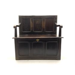 George lll stained oak box settle, panelled back and shaped arms, hinged seat enclosing interior, raised on stile supports 