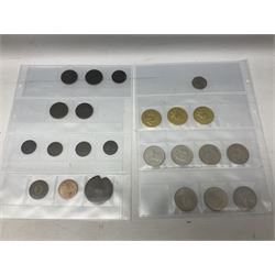 Great British and World coins, including pre decimal pennies and other denominations, commemorative crowns, Queen Elizabeth II 2002 five pound coin, four old style two pound coins, United States of America 1974 one dollar coin etc and various banknotes including Bank of England one pounds, in one box