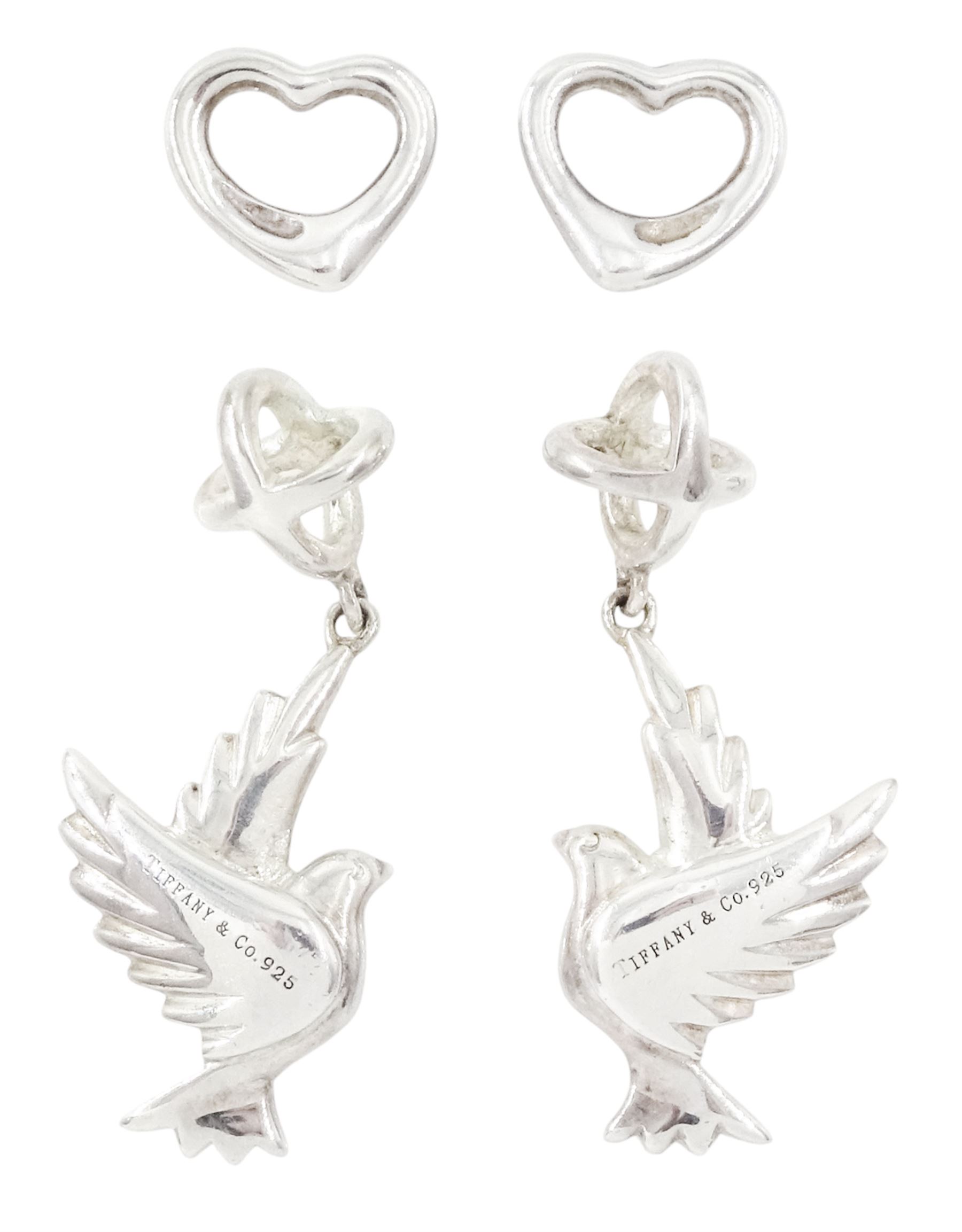 Tiffany & Co two pairs of silver stud earrings including pendant dove earrings designed by Paloma Picasso and heart earrings designed by Elsa Peretti
