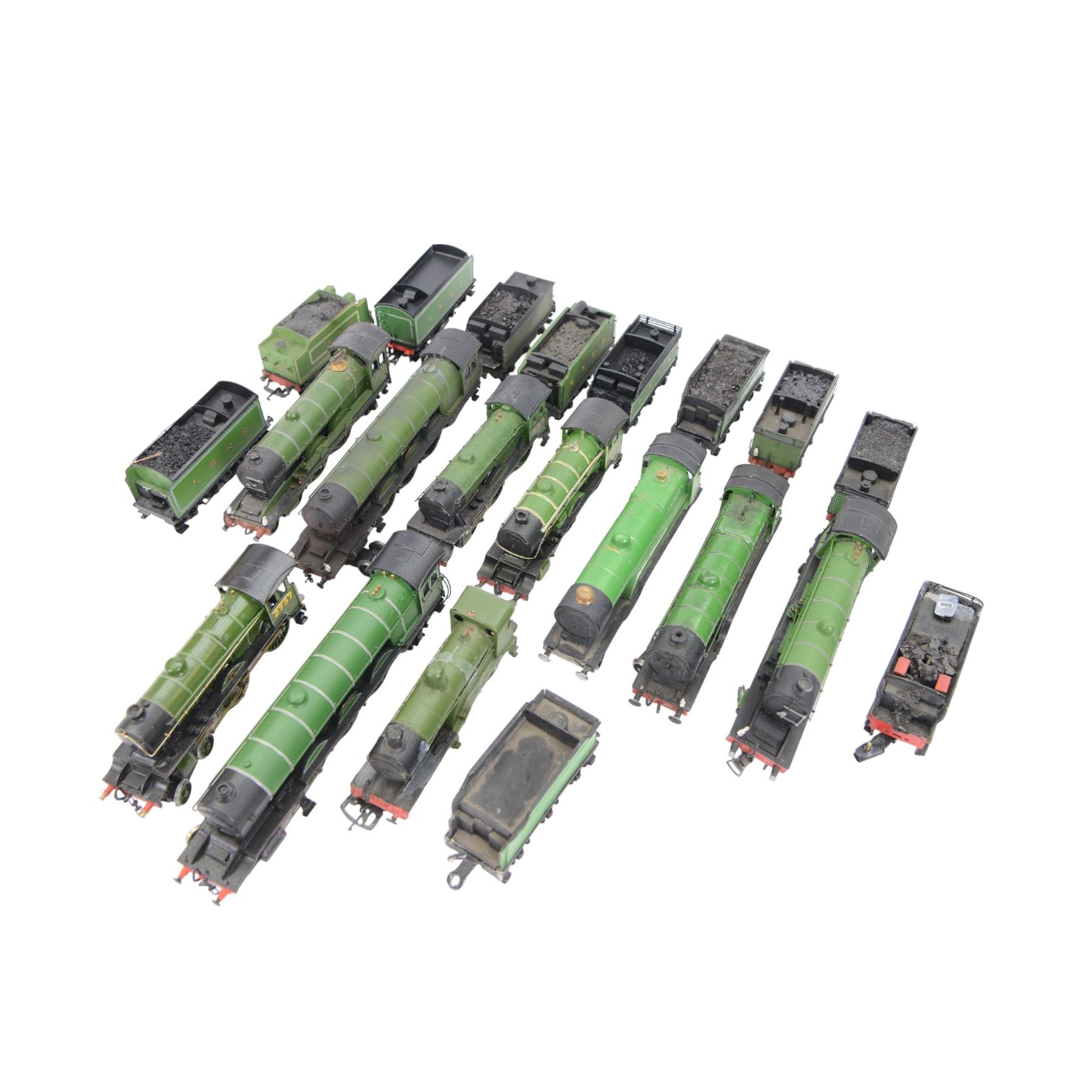 Ten 00 gauge kit built locomotives and eleven kit built tenders, all in green livery
