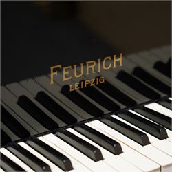 Feurich of Leipzig - German overstrung medium grand piano in a black lacquered case, with a seven octave M&K of Leipzig roller action keyboard, original strings and tuning pins, new hammer heads and dampers, with sostenuto and sustain pedals, adjustable music desk and matching adjustable stool.