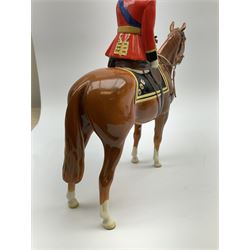 A Beswick model of HM Queen Elizabeth II mounted on Imperial Trooping the colour 1957, model no 1546, H26.5cm.