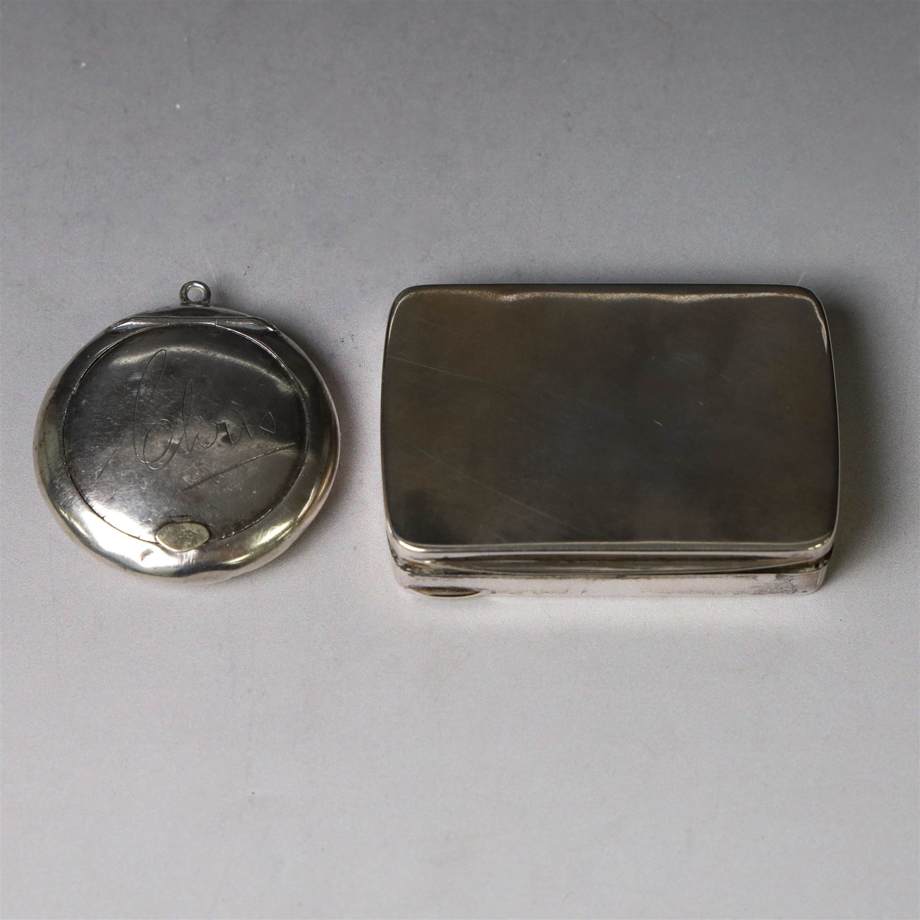 Edwardian silver compact, of circular form with mirror to interior, engraved with name to cover and underside, hallmarked S Blanckensee & Son Ltd, Birmingham 1910, together with a plain continental silver snuff box, stamped 800, box W8cm