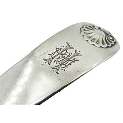 George IV silver Fiddle and Shell pattern table spoon, hallmarked James & Walter Marshall, Edinburgh 1823, also marked DM, together with five Victorian teaspoons with engraved detail to stems, hallmarked Josiah Williams & Co, London 1894, approximate total weight 4.72 ozt (147 grams)
