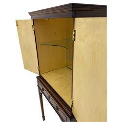 Mid to late 20th century mahogany cocktail cabinet, maple lined interior with mirrored back and glass shelf, fitted with two drawers, square tapering supports with spade feet