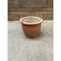 Cast iron cauldron set pot with 2 terracotta chimney pots and 2 terracotta planters,