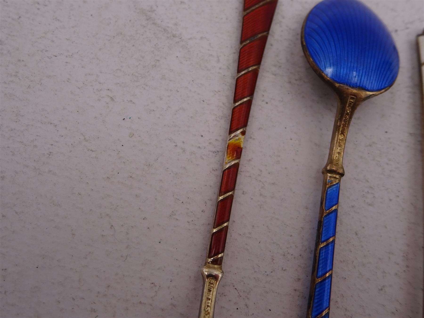 Set of six Danish silver gilt coloured guilloche enamel coffee spoons, each spoon with twist design enamel handle and ball finial, stamped Ela Denmark Sterling, in case