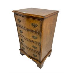 Georgian design walnut serpentine chest, banded top with boxwood stringing, fitted with four cock-beaded drawers, on bracket feet