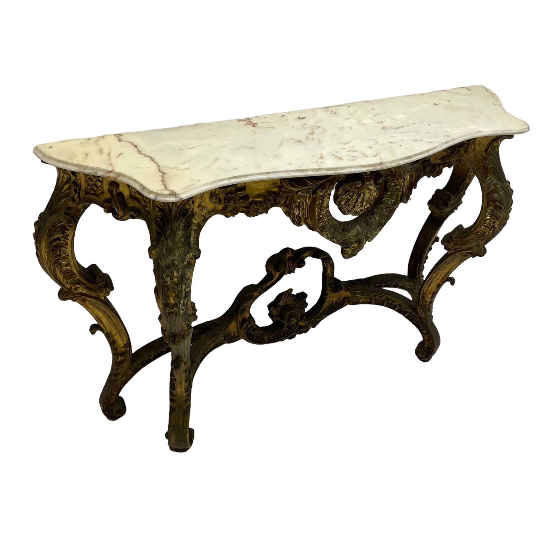 French Rococo design console or pier table, shaped and moulded pale marble top, the apron carved with pierced shell and scrolling acanthus leaves, extending flower head decoration, on four acanthus carved cabriole supports with scrolled terminals, united by shell moulded stretcher rails with central scrolled foliage cartouche 