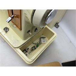 Vintage Brother electric sewing machine in case together with a Frister and Rossmann model 45 sewing machine in case
