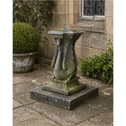 Late 20th century terracotta twin swan sundial, well figured seated back to back with shap...