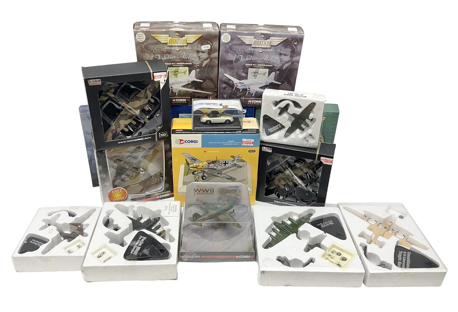 Fifteen modern die-cast models of aircraft by Corgi, Atlas Editions and Ixo including Aviation Archive, War Birds, Fighters of WWII etc; and model of an MGB Sports Car; all boxed (16)