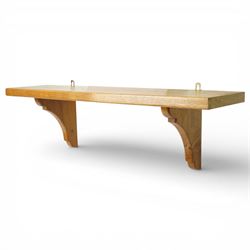 Beaverman - wall shelf single plank, with metal hangers, by Colin Almack of Sutton near Thirsk