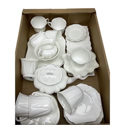 Shelley Dainty White Tea Wares of moulded lobed form, with leaf decoration (Shelley reg no. 272101), including teapot, milk jug, sugar bowl, six mugs, two cake plates etc (41)
