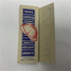 WWII Free French 1944 card member's insignia; and unused 1944 pack of FFF cigarette papers (2)