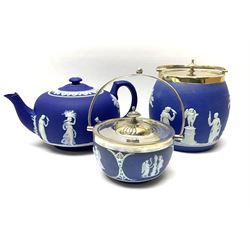 Three pieces of Victorian Wedgwood Jasperware, comprising biscuit barrel with silver plated lid and handle, H17cm, further barrel with silver plated lid and handle, H11cm, and teapot, H13cm, each with impressed marks beneath. 
