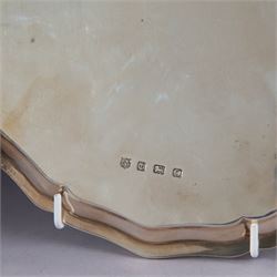 1930s silver salver, of circular form with beaded pie crust rim and upon four claw and ball feet, with presentation engraving to centre reading 'Presented to Second Lieutenant FR Himsworth Royal Signals by the Officers of the 50th Nottingham Motor Divisional Signals on the Occasion of his Marriage 10th September 1939', bordered by the engraved signatures of his colleagues, hallmarked Barker Brothers Silver Ltd, Birmingham 1938, D25cm