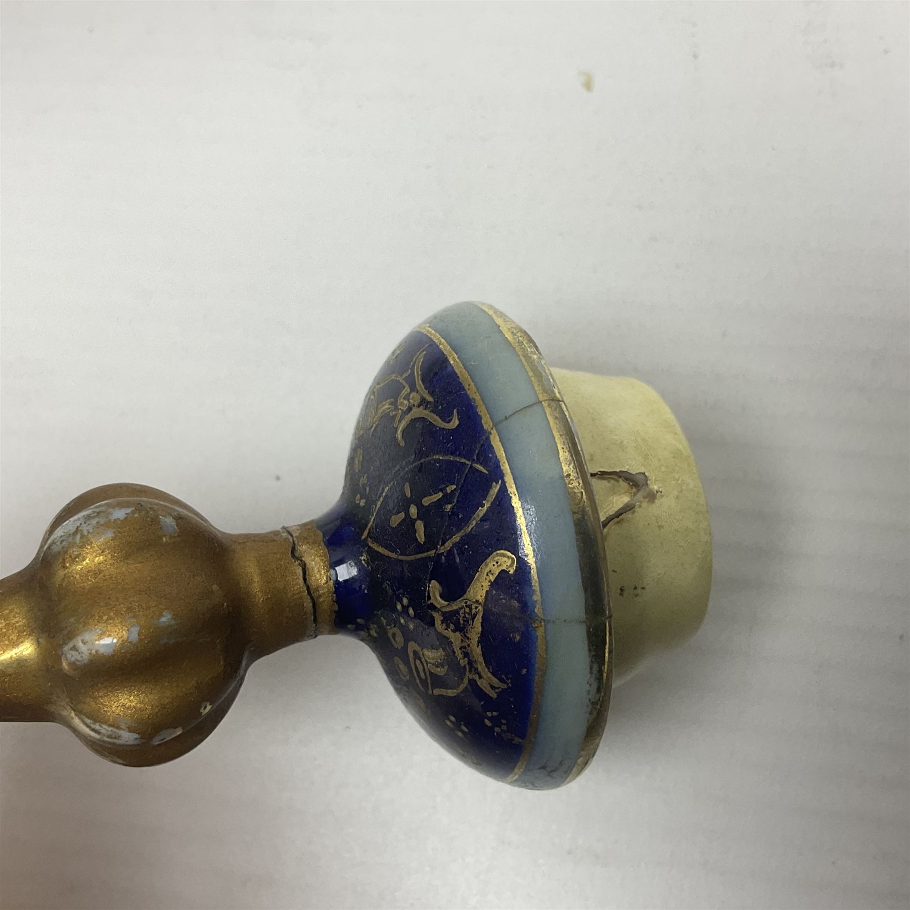 19th century Vienna style porcelain 'Musik' garniture, the central vase of baluster form with domed cover flanked by two smaller vases with twin curved gilt handles to short neck, each decorated with classical figural vignettes between blue borders heightened with gilt, H33.5cm