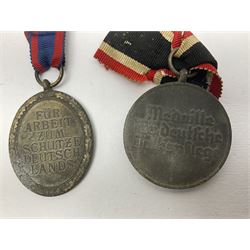 Five WW2 German medals/badges -German Defences West Wall Medal, War merit Cross, Red Cross Decoration, RAD tinnie brooch and Adolf Hitler 1934 medallion (5)