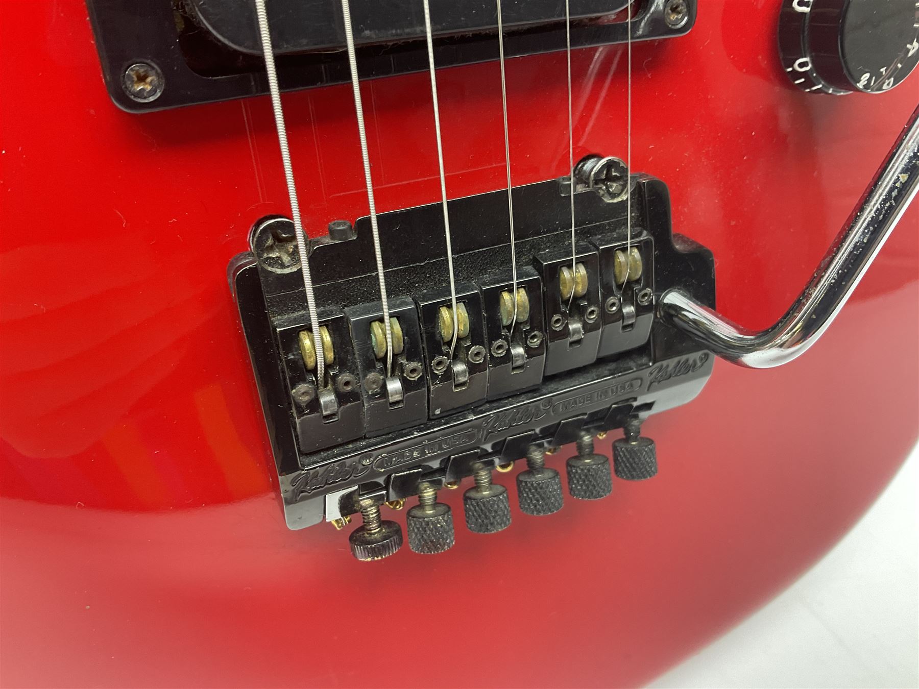 American Peavey Nitro 1 hand-made electric guitar in red with Kahler tremolo, serial no.02786479, L98cm overall; in soft carrying case.