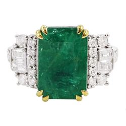  18ct white gold emerald cut emerald ring, each side set with round brilliant cut and baguette cut diamonds, with diamond set shoulders,  stamped 750, emerald 4.77 carat, with World Gemological Institute report