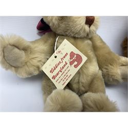 Group of five teddy bears comprising ‘George’ a unique pellet filled bear with glass eyes and velvet paws H38cm, and ‘Abbey’ a luxury German plush with wobble head and glass eyes no.5/10 H24cm, both with Teddies from Bearyland labels; along with two light blonde mohair H. M. Bears and Boyds Bears ‘T. F. Wuzzies’ no. 595140 (5)