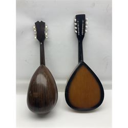 French mandolin with segmented lute back and mother-of-pearl inlaid spruce top; bears label for 'Jerome Thibouville-Lamy & Cie Paris L60cm; and another unmarked flat-back mandolin; both for completion (2)