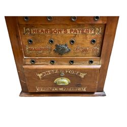 'Hearson's Patent Champion Incubator' mahogany paraffin egg incubator, decorated with 'Proprietors
Spratt's Patent Ld' in gilt scrolls, with central plaque and brass handle, H52cm W54cm excl side fitting