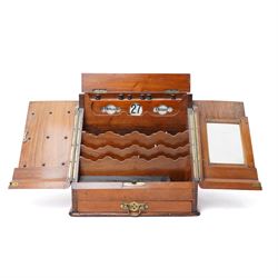 Edwardian walnut stationery casket, the dividing doors revealing a fitted interior with stationery racks and perpetual calendar, single drawer under W30cm