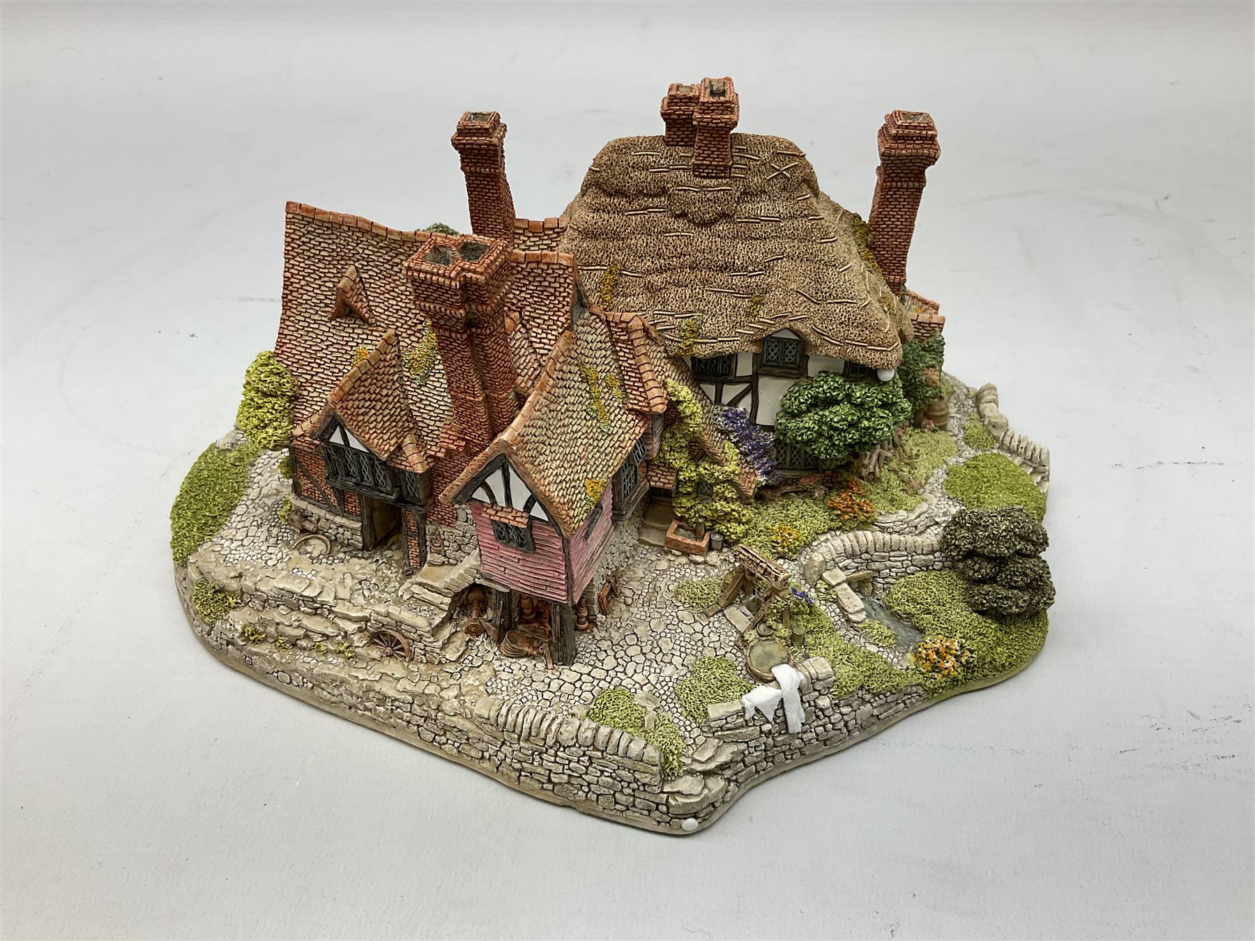 Two limited edition Lilliput Lane cottages, comprising Oakwood Smithy and Blair Athol, both boxed with deeds