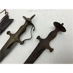 Late 19th/early 20th century Indian Tulwar sword with 81cm plain curving steel blade and iron hilt with extended langets, knucklebow and spiked pommel; in leather covered scabbard L100cm overall; and another Tulwar lacking scabbard in almost relic condition (2)
