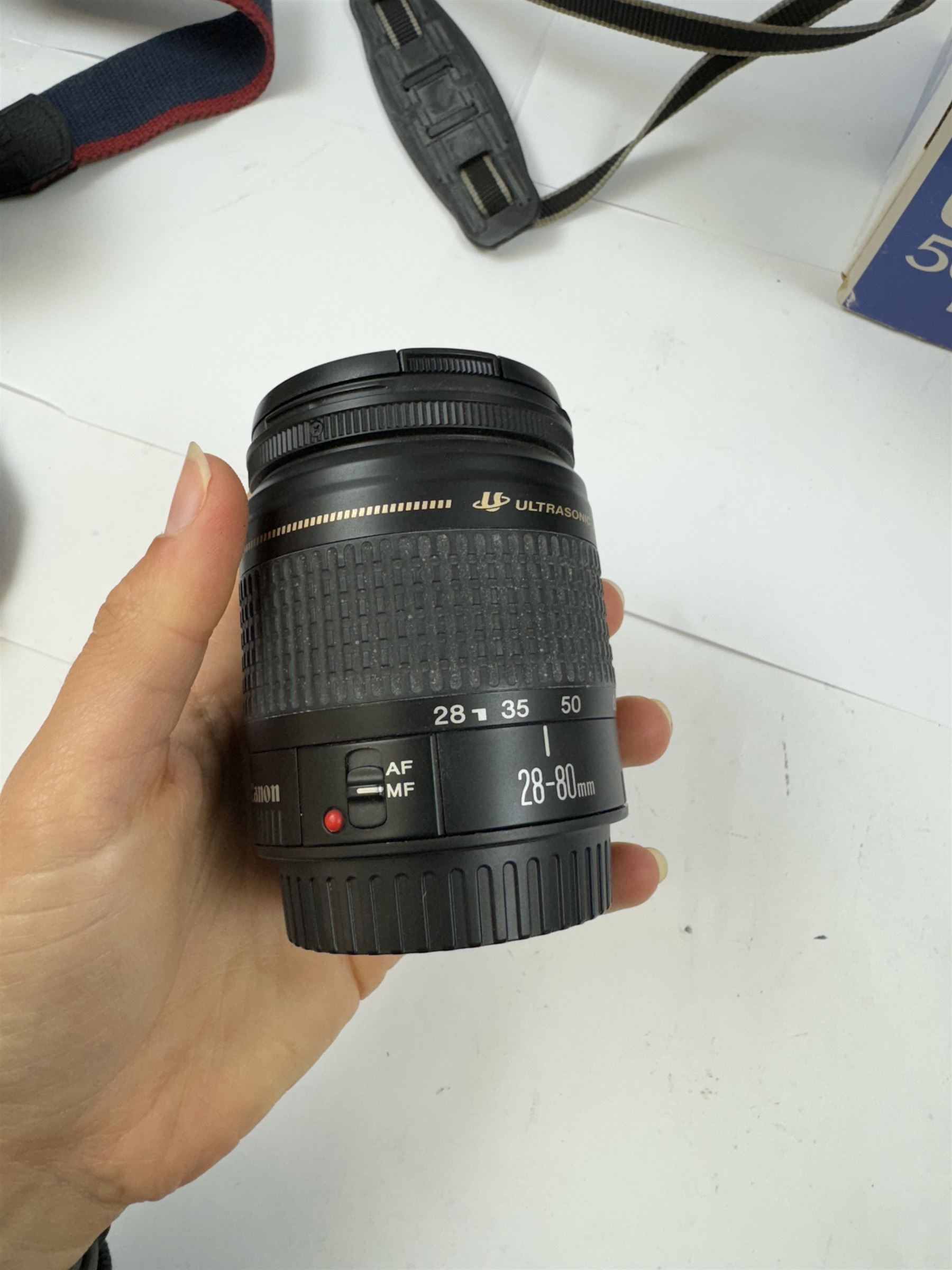Three Canon EOS cameras, comprising EOS 500N Silver Kit, serial no. 9660130 with Canon EF 28-80mm 1:3.5-5.6 IV zoom lens, serial no. 9505171, EOS 300 with Canon EF 28-90mm 1:4-5.6 zoom lens, serial no. 5828460, and a Sigma 28-300mm 1:3.5-6.3 macro zoom lens, serial no. 1027931 and an EOS 600 camera body, serial no. 2651130, two boxed and one in carry case