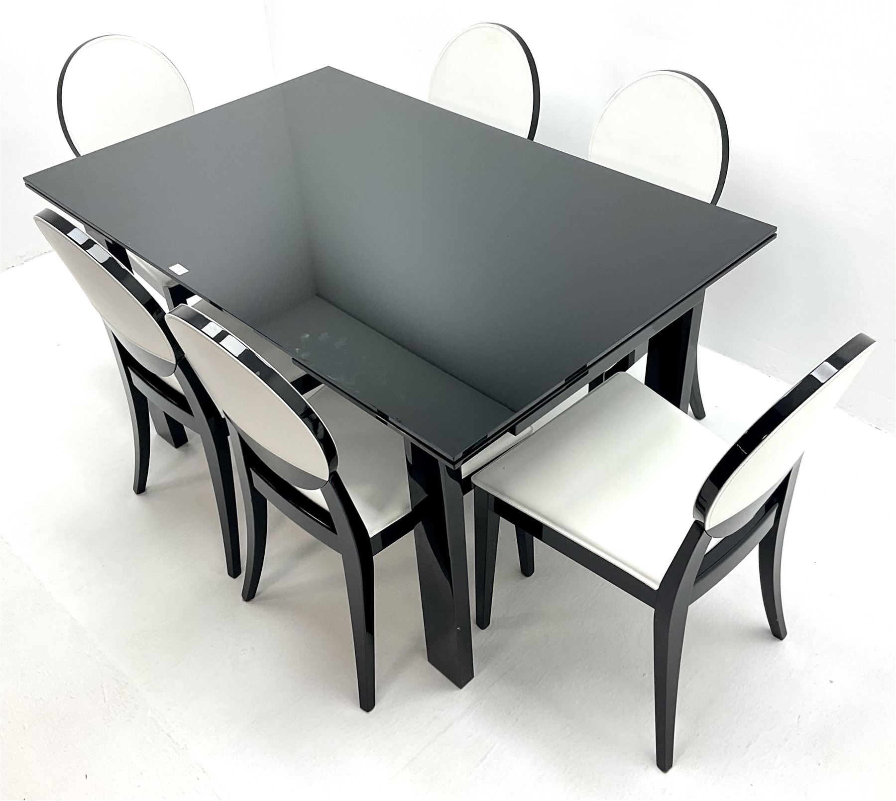 Ponsfords Sheffield Italian black gloss and glass extending dining table, rectangular supports (W220cm & 140cm, H77cm, D90cm) and set six chairs black and white dining chairs (W48cm)