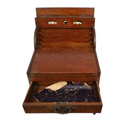 Victorian oak perpetual calendar roll-top desk, tambour front enclosing fitted interior with pigeonholes and pen trays, the raised back fitted with rotating date and month apertures, over single frieze drawer with cast brass handle, on plinth base