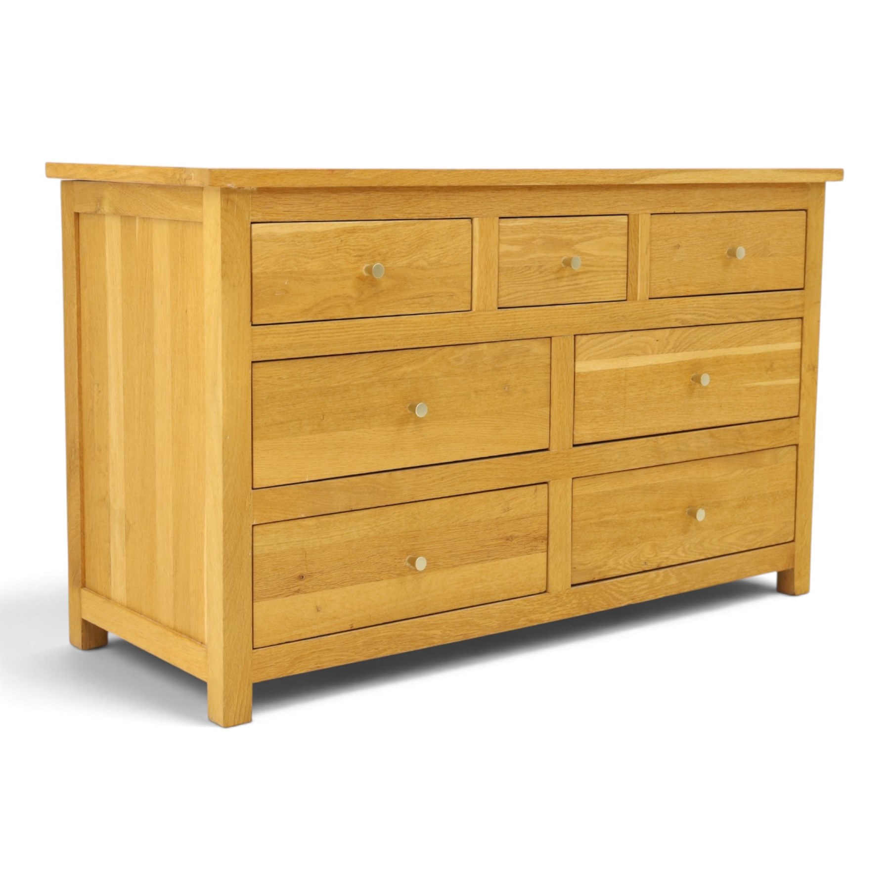 Contemporary light oak chest, rectangular top fitted with three short over four long drawers, on square feet