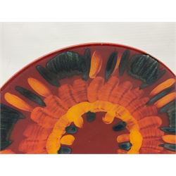 Collection of Poole Pottery, comprising charger and vase in Volcano pattern and a duck figure in a similar pattern 