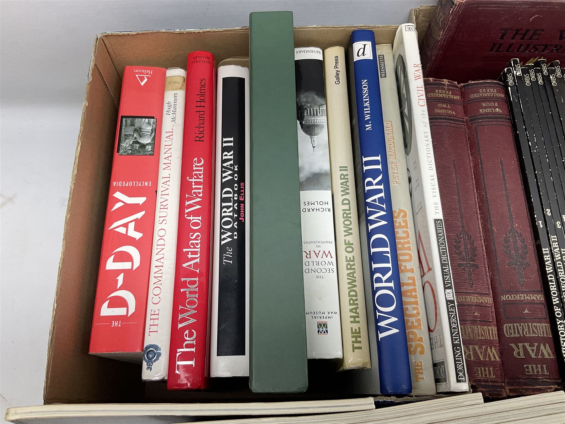 Three boxes of books, periodicals and DVDs of military interest with particular emphasis on WW2 including The History of World War Two in thirty original parts by Orbis, The D-Day Experience by Richard Holmes, The World War Two Databook, The World at War, Special Forces etc
