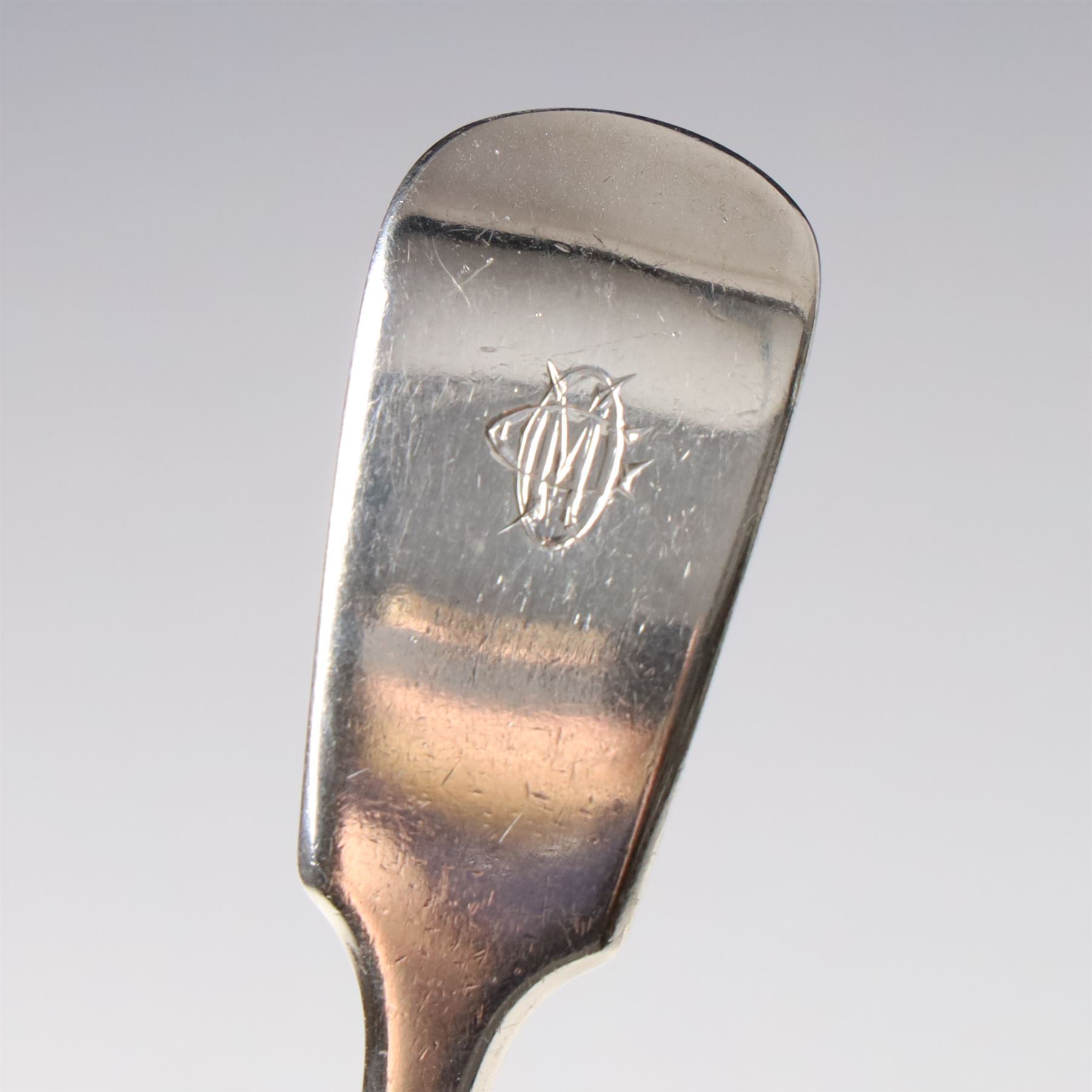 19th century Scottish silver fiddle pattern toddy ladle, Edinburgh 1837 Maker Millidge & Son, another Edinburgh 1835 Maker James McKay, George IV silver sauce ladle with fluted bowl London 1825 Maker Charles Eley and an Edwardian sauce ladle (4)