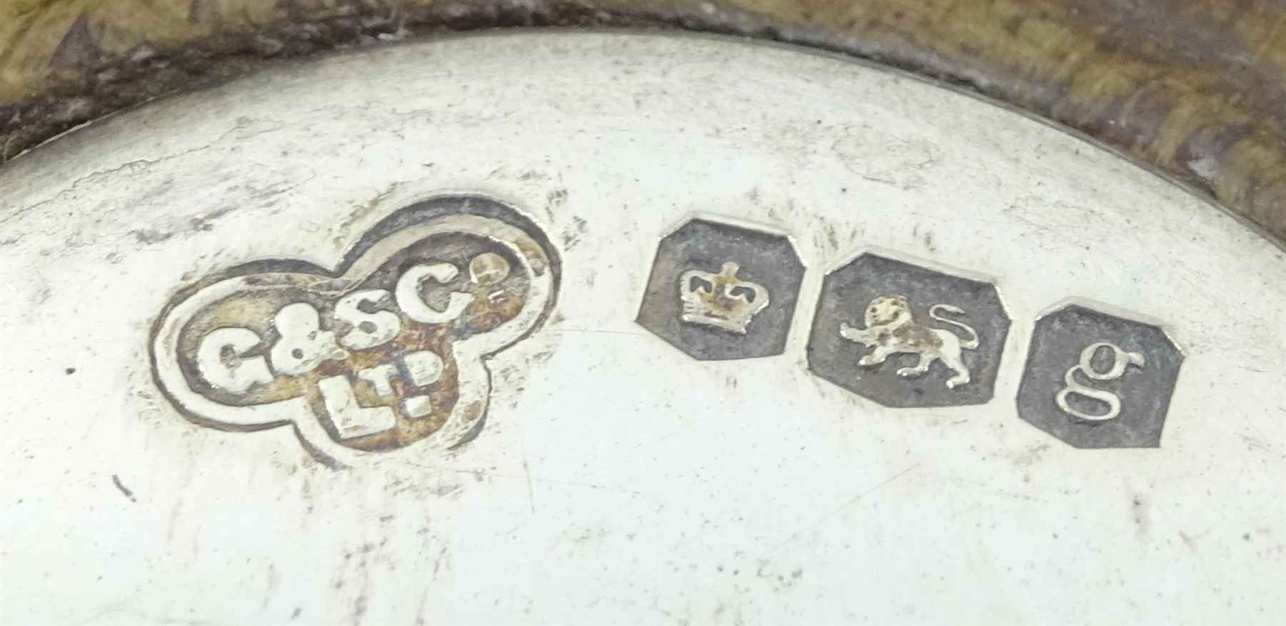 Pair of silver mounted oak coasters, pierced and engraved decoration by