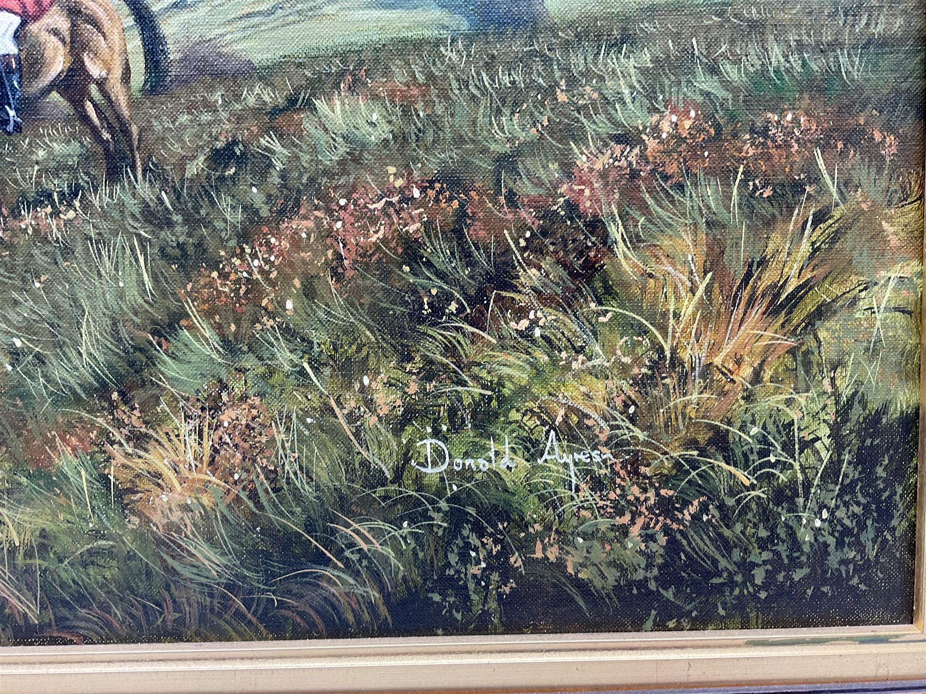 Donald Ayres (British 1936-): Huntsman and Hounds at 'Cuckmere River - Sussex', oil on canvas signed, titled verso 49cm x 99cm
Provenance: private collection, purchased Dee, Atkinson & Harrison 8th July 2005