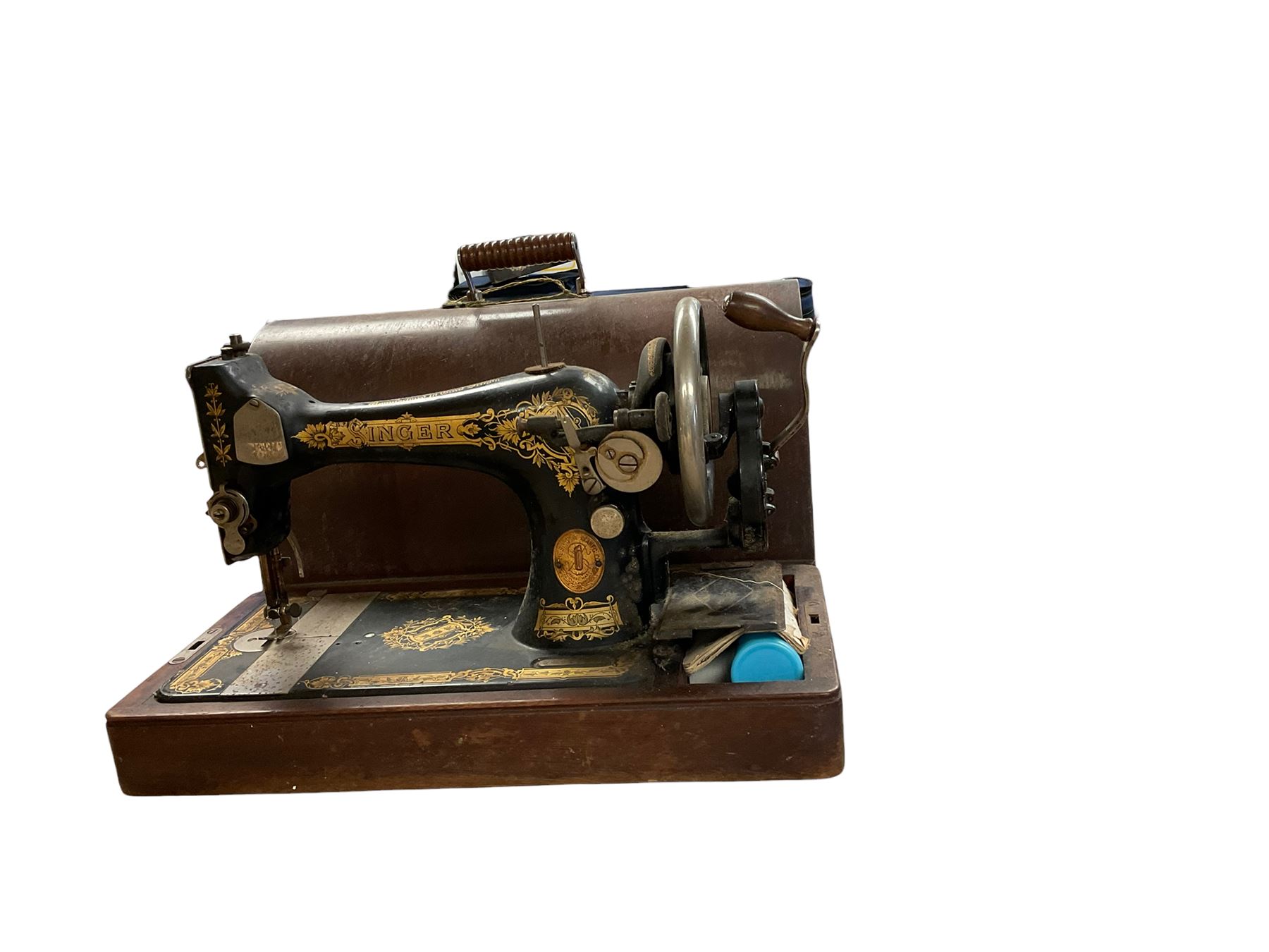 Cased Singer sewing machine, with two table lamps including a brass corinthian column example