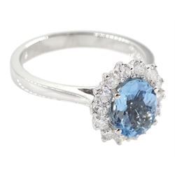 18ct white gold oval aquamarine and round brilliant cut cluster ring, hallmarked, aquamarine approx 1.05 carat, total diamond weight approx 0.40 carat