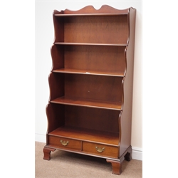  Reproduction mahogany waterfall bookcase, four shelves, two drawers, shaped bracket supports, W81cm, H152cm, D39cm  