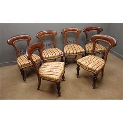  Set six Victorian mahogany dining chairs, shaped cresting rail with carved middle rails, floral upholstered seat, turned and faceted supports  