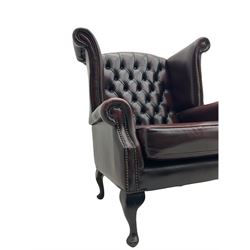 Thomas Lloyd - Georgian style wing back armchair, upholstered in buttoned oxblood leather