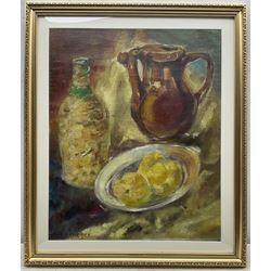 Pinchus Krémègne (Belarusian/French 1890-1981): Still Life of a Stoneware Jug Bottle and Fruit, oil on canvas laid on board signed 53cm x 43cm 
Notes: Krémègne was a Lithuanian Belarusian Jewish-French artist, primarily known as a sculptor, painter and lithographer. He was a native of Zhaludak near Lida, now Belarus, and was a friend of both Chaïm Soutine and Michel Kikoine. He studied sculpture at the Vilnius Academy of Art, and died at Ceret France.